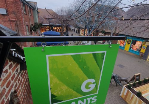 Projecting signage, hanging signage, graphic design bespoke signage, bespoke design, advertising, road side signage