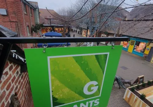 Projecting signage, hanging signage, graphic design bespoke signage, bespoke design, advertising, road side signage